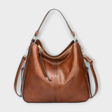 Sara™  - Mala Hobo Clássica com Acabamento Brilhante